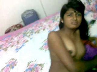 A young Indian woman engages in sexual intercourse with her partner at his residence