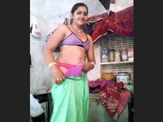 Intimate moment between freshly married couple