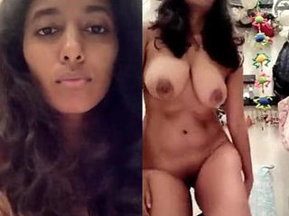 Busty Indian woman displays her assets