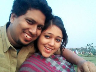 Kiran, a sultry Indian wife, engages in intimate activities with her husband's friend in a video