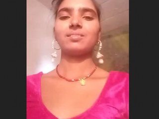 Village girl engages in intimate activity with her partner on camera