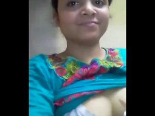 A loving girlfriend shares her intimate self-portrait with her partner, showcasing her beauty