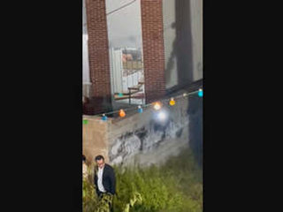 A mature Indian couple's intimate moment in a car is interrupted