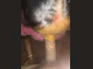 Aroused wife eagerly pleasuring her young lover's penis