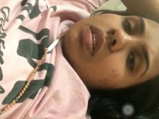 A lovely college girl displays her breasts during a video chat