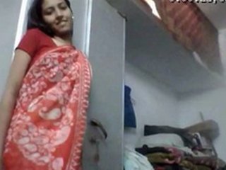 A teen's provocative strip show in a saree for financial gain