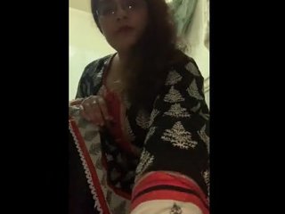Pakistani housewife seductively strips and poses for camera