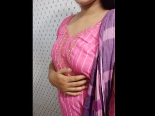 A seductive South Asian woman takes a nude bath