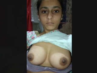 Young Muslim girlfriend reveals her perky breasts