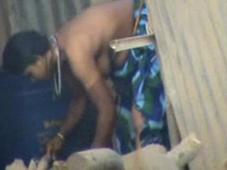 South Asian woman displays her unshaved genital area