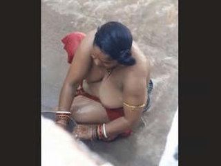 Elderly wife's open-air bath time