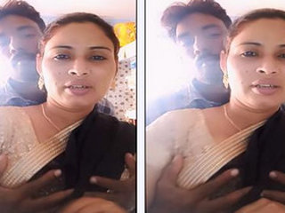 Indian bhabi's breasts on a pressing surface