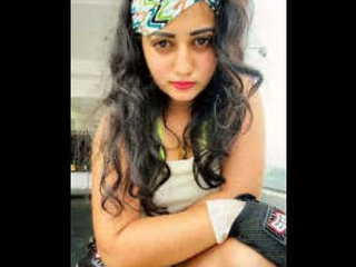 A charming girl shares intimate moments with her boyfriend by recording herself fondling her breasts and showcasing her buttocks