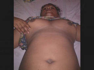 Aroused wife pleasuring herself