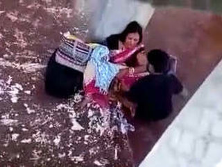 A mature woman with large breasts has her outdoor pussy pleasured with oral sex and fingers, while making audible sounds of pleasure