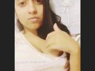 A stunning Asian beauty indulges in self-pleasure