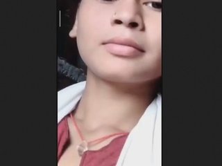 A tantalizing Indian girl with large breasts seduces and enchants