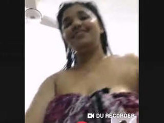 Seductive wife takes a bath while video chatting