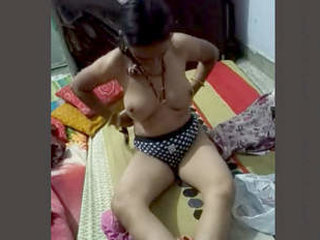 Uncle's wife changing outfits while he films