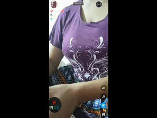 Raabina's intimate performance with big breasts and buttocks