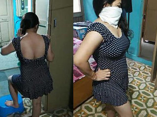 Hot Indian auntie's seductive poses in revealing dress