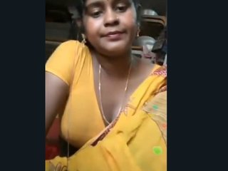 Indian wife seductively poses for camera