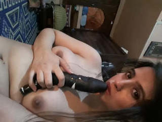 A desi woman undresses and pleasures herself
