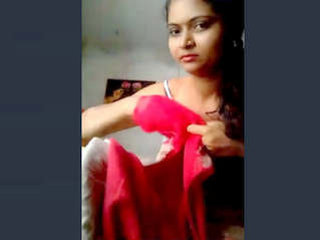 A sexy Indian girl reveals her breasts and intimate parts