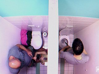 Lovita Fate pleasures herself while also giving oral pleasure to her partner in the bathroom