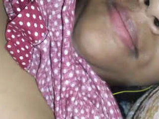 Seductive girl displays wet vagina