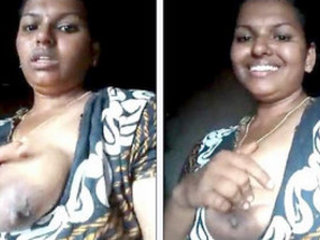 Aunty flaunts her big natural breasts in public