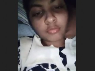 Cute Indian girl demonstrates fingering techniques in explicit video