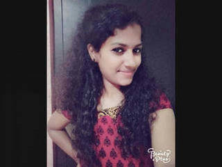 Tamil girl flaunts her big boobs in a seductive manner