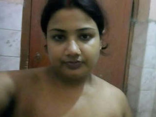 Auntie's sexy selfies in the bathroom with her perky boobs