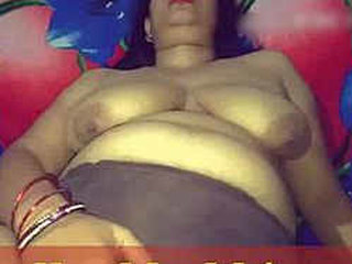 Mature aunty Sougandha indulges in self-pleasure and sucks a hard cock