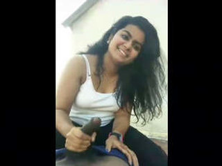 Tamil girlfriend enjoys a sensual handjob and moans in pleasure