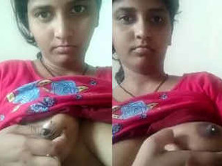 Desi girl presses her nipples together in solo video