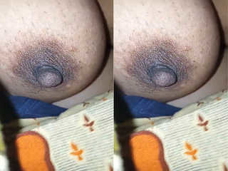 Exclusive video of husband pressing his wife's boobs to his chest