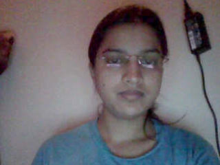 Cute girl indulges in solo play