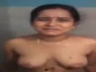 Telugu bhabhi's nude bath and clothing in HD video