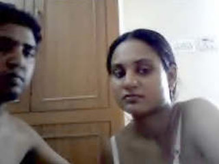 Indian bhabhi and her naked husband in a steamy video