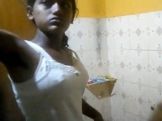 Paid Indian girl flaunts her breasts in a seductive manner
