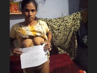 Bhabi from a village flaunts her big boobs and pussy