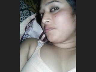 Attractive married woman from a village in a steamy video