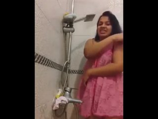Hot Tamil girl takes a bath in front of the camera