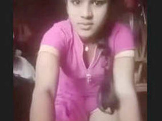 Watch a cute girl from the village pleasure herself with her fingers