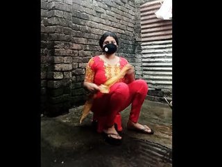 Akha girl in sexy dress enjoys a steamy shower in the village