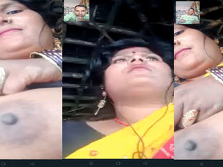 Chapra's wife flaunts her large breasts in front of the camera