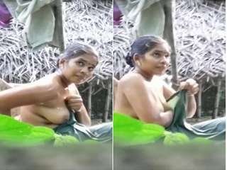 Desi bhabhi's secret outdoor bathing session caught on camera