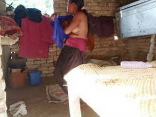 Country girl caught wearing clothes after bathing in the village